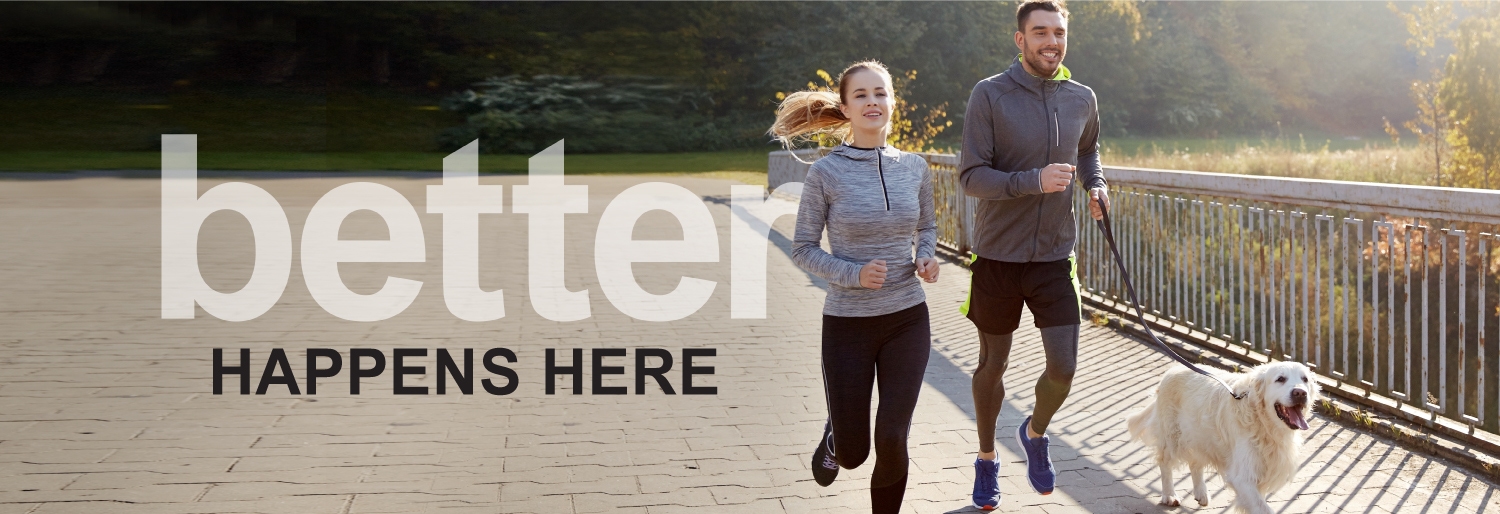 Man and Woman jogging with dog