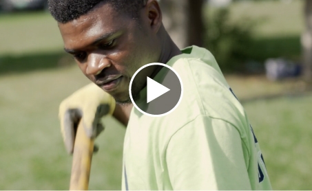 man working for a community project