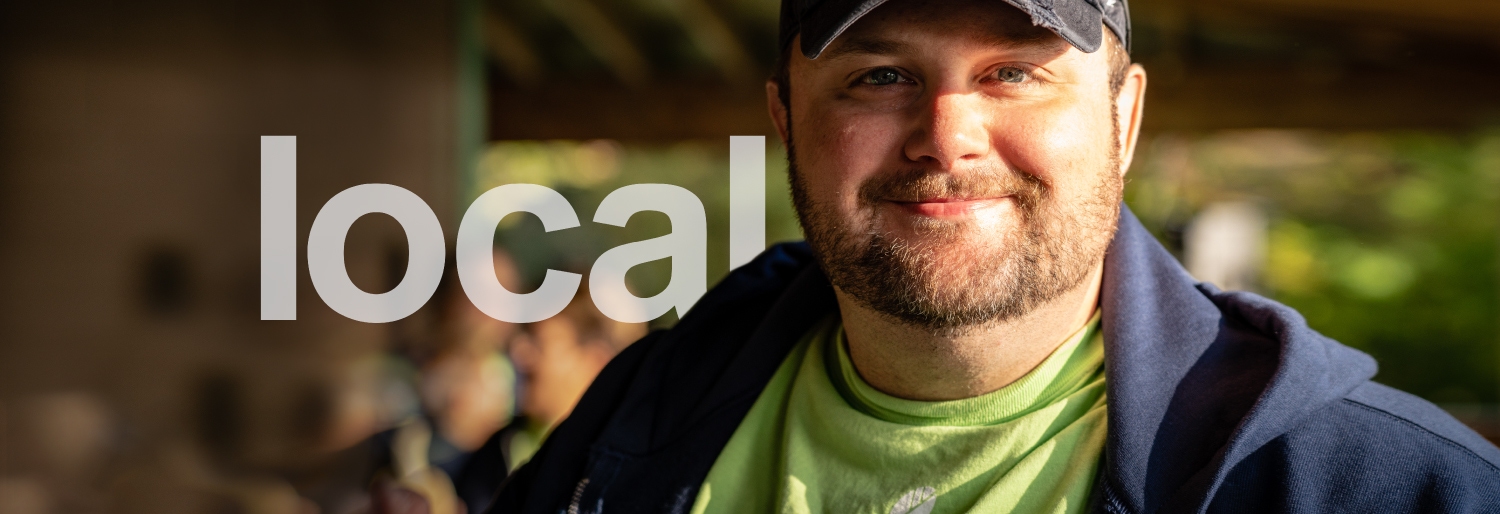 male community member smiling